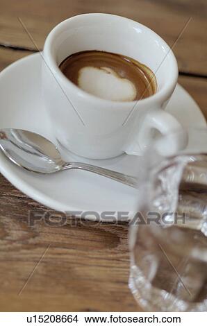 Espresso with milk froth topping View Large Photo Image Picture - Espresso with milk froth topping. Fotosearch