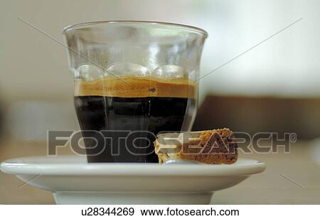 Espresso with piece of cake View Large Photo Image Stock Photo - Espresso with piece of cake. Fotosearch