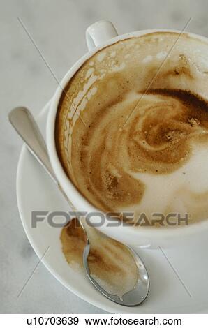Stock Photo - Half-full Cappuccino cup. Fotosearch