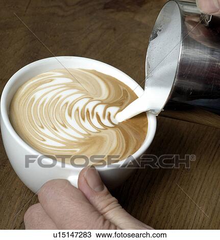 Making a cappuccino ornament View Large Photo Image Stock Image - Making a cappuccino ornament. Fotosearch