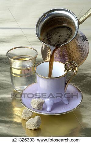 Stock Image - Making a Turkish coffee. Fotosearch