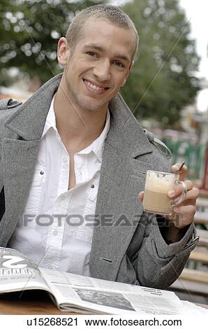 Man with journal an Coffee View Large Photo Image Stock Image - Man with journal an Coffee. Fotosearch