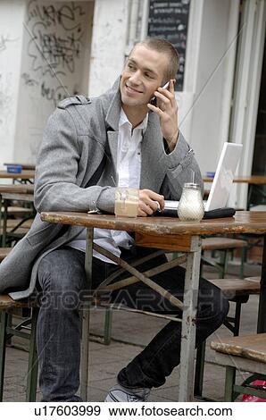 Stock Photo - Man with laptop an Coffee. Fotosearch