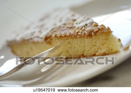 Piece of almond cake View Large Photo Image Stock Photo - Piece of almond cake. Fotosearch