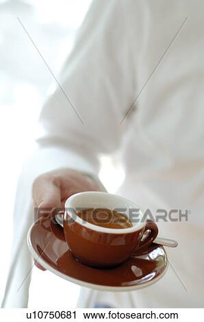 Stock Image - Serving black coffee. Fotosearch