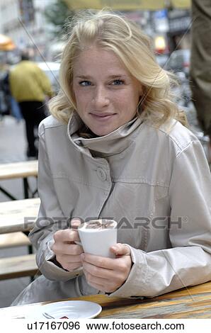 Woman holding a coffe pot View Large Photo Image Stock Photograph - Woman holding a coffe pot. Fotosearch