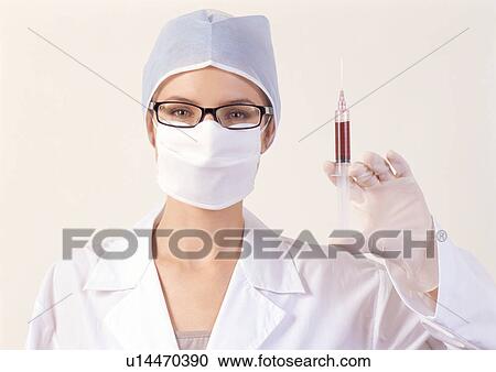 Stock Image - eye glasses, head and shoulder, holding. Fotosearch