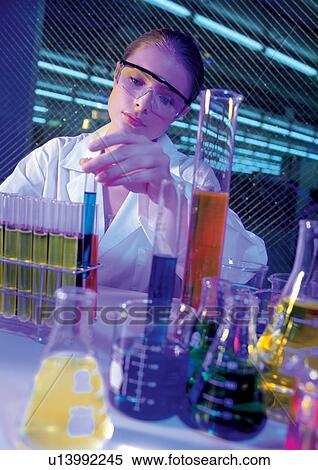 Female researcher with protective glasses View Large Photo Image Stock Photography - Female researcher with protective glasses. Fotosearch