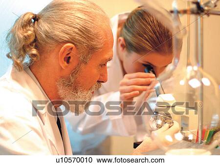 lab coat, development, indoor, technology, looking through, testing View Large Photo Image Stock Image - lab coat, development, indoor, technology, looking through, testing. Fotosearch