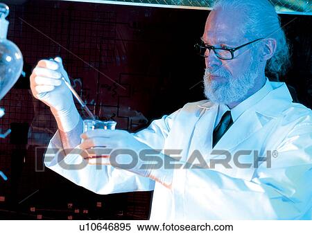Stock Photography - lab coat, pipette, goggles, technician, grey hair. Fotosearch