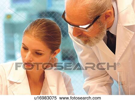 looking down, elderly man, hand on neck, working, science, research View Large Photo Image Stock Photography - looking down, elderly man, hand on neck, working, science, research. Fotosearch