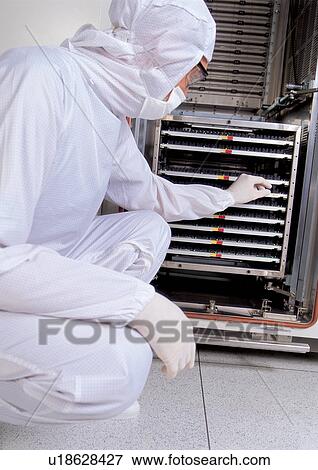 Stock Photo - r&d matters, r & d, r & d matters, one person, protective glasses. Fotosearch
