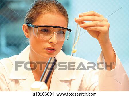 r&d matters, science, holding, liquid, looking View Large Photo Image Stock Image - r&d matters, science, holding, liquid, looking. Fotosearch