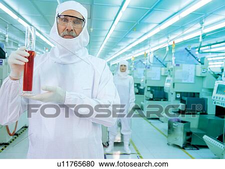 Stock Image - research, elderly man, female, two people, one person, standing. Fotosearch