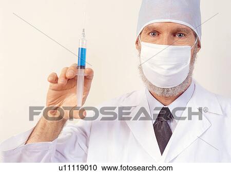 Stock Image - tie, elderly man, r & d, science, lab coat, white background. Fotosearch