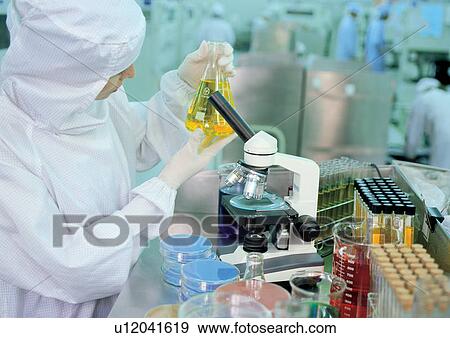 Woman working in a science lab View Large Photo Image Stock Photo - Woman working in a science lab. Fotosearch