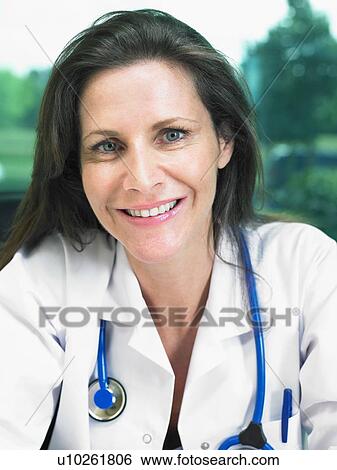 Portrait of female doctor. View Large Photo Image Stock Photograph - Portrait of female doctor.. Fotosearch