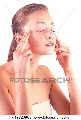 Stock Image - applying, close-up, care, beauty treatment, adoring. Fotosearch