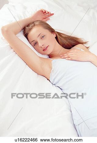 Stock Photograph - bedding, youth, nightdress, person, female, woman, night dress. Fotosearch