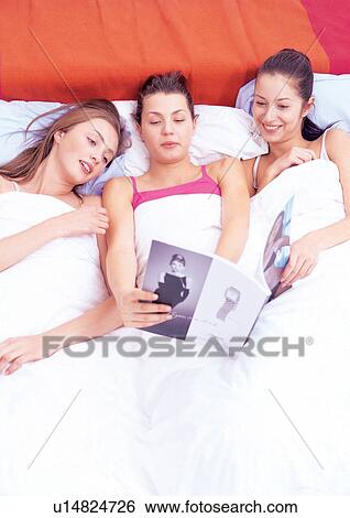 brown hair, long hair, beautiful, togetherness, beauty, bedding View Large Photo Image Stock Photograph - brown hair, long hair, beautiful, togetherness, beauty, bedding. Fotosearch