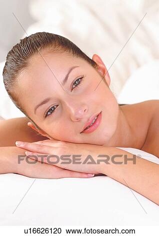 Stock Image - close-up, indoors looking at camera, lying down. Fotosearch