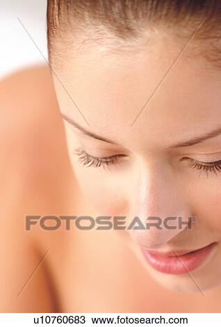 Stock Image - close-up, young woman, one person, young adult. Fotosearch