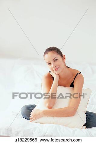 happy, looking at camera, portrait, sitting View Large Photo Image Stock Photograph - happy, looking at camera, portrait, sitting. Fotosearch