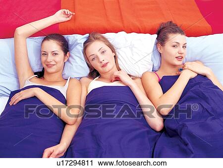 Stock Image - happy, smiling, teenagers, human face, longhair, young women. Fotosearch