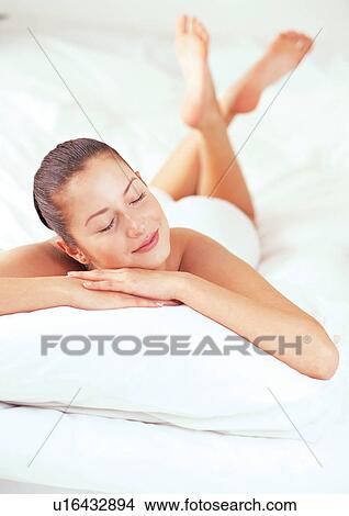 indoors lying down, pillow View Large Photo Image Picture - indoors lying down, pillow. Fotosearch