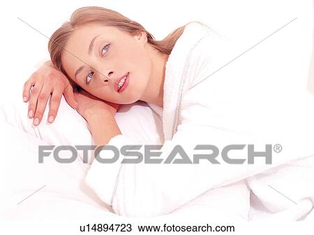 indoors lying down, young woman, sleeping dress View Large Photo Image Stock Image - indoors lying down, young woman, sleeping dress. Fotosearch