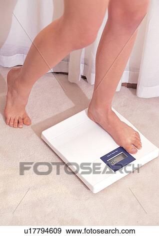 instrument, weighing machine, part, human legs, bare foot View Large Photo Image Stock Photo - instrument, weighing machine, part, human legs, bare foot. Fotosearch