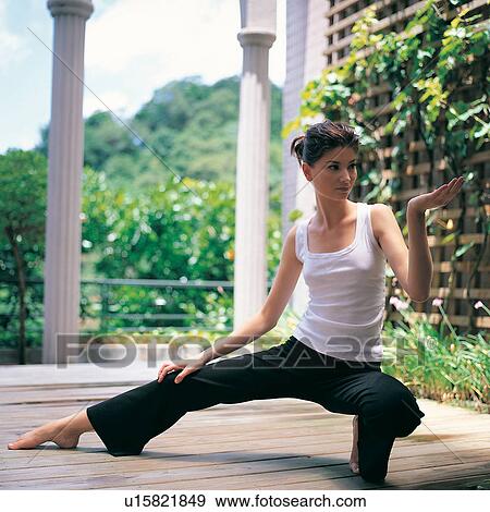 Stock Photo - Barefoot, Black, Casual Clothing. Fotosearch