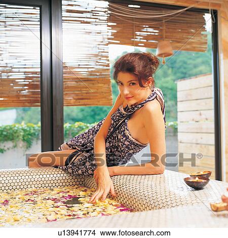 Picture - Bathroom, Bathtub, Blinds, Brown Hair, Casual Clothing. Fotosearch