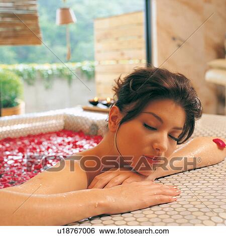 Stock Photograph - Health Spa, Wet, Brown Hair, Spa Treatment, Young Adult, Blinds, Medium-Length Hair. Fotosearch