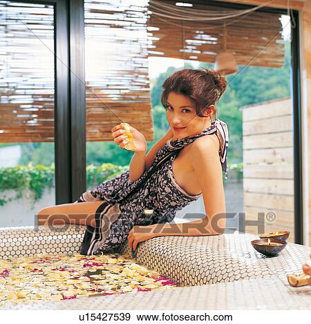 Stone, Casual Clothing, One Young Woman Only, Leaning, Enjoyment, Indulgence View Large Photo Image Stock Photo - Stone, Casual Clothing, One Young Woman Only, Leaning, Enjoyment, Indulgence. Fotosearch