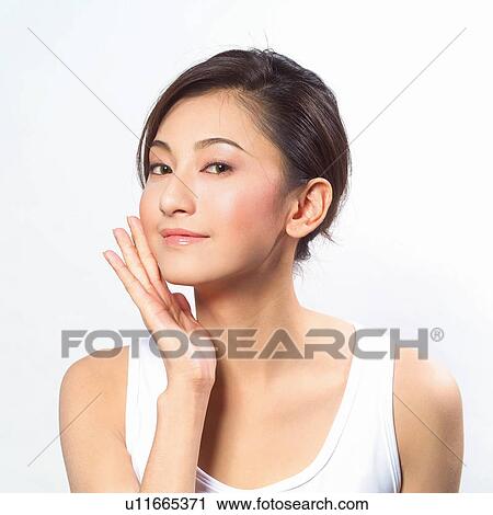 Stock Image - Female feature, Black Hair, woman feature, Feature, Brown Hair, Asian Ethnicity. Fotosearch