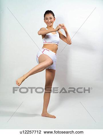 Indoor, Exercising, Hair Back, Real People, Sports Bra View Large Photo Image Stock Image - Indoor, Exercising, Hair Back, Real People, Sports Bra. Fotosearch