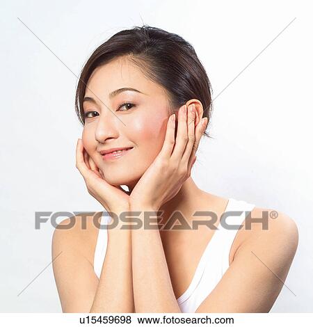Smiling, Feature, Portrait, Black Hair, Long Hair, Well Being, Indoor View Large Photo Image Stock Photo - Smiling, Feature, Portrait, Black Hair, Long Hair, Well Being, Indoor. Fotosearch