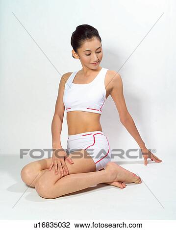 Stock Image - woman feature, Barefoot, Feature, Brown Hair, Black Hair, Asian Ethnicity. Fotosearch