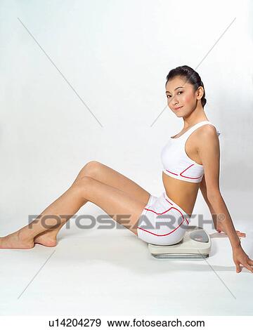 woman feature, Barefoot, Feature, Brown Hair, Black Hair, Asian Ethnicity View Large Photo Image Stock Photo - woman feature, Barefoot, Feature, Brown Hair, Black Hair, Asian Ethnicity. Fotosearch