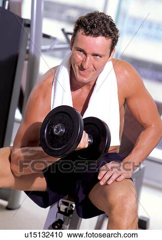 Stock Image - arm outstretched, bare chest, activity. Fotosearch