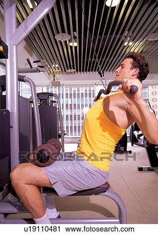Stock Image - arms exercises, chest exercises, activity. Fotosearch