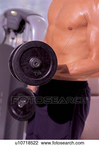 Stock Image - endurance, one person, holding, strength. Fotosearch