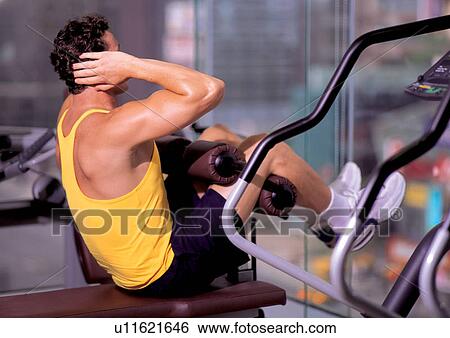 exercising, effort, fitness gym, body, equipment, activity View Large Photo Image Stock Photograph - exercising, effort, fitness gym, body, equipment, activity. Fotosearch