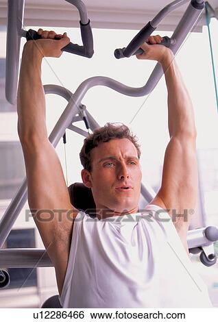 physical exertion, power, one person, physical, dedication, exercise equipment, lifestyle View Large Photo Image Stock Photograph - physical exertion, power, one person, physical, dedication, exercise equipment, lifestyle. Fotosearch