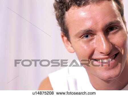 Stock Photo - power, strong, physical, looking at camera, young adult, fitness gym. Fotosearch
