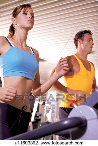 Stock Image - strong, fitness gym, arms outstretched, energy, figure, leisure activity. Fotosearch