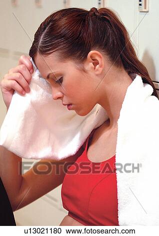 Stock Image - Woman after a hard workout. Fotosearch
