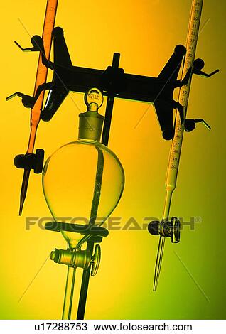 Stock Image - Back Lit, Beaker, Chemical, Close-Up, Colored Background. Fotosearch