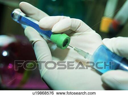 Liquid, Holding, Medical Instrument, Human Finger, Syringe, Science And Technology, Test Tube View Large Photo Image Stock Photograph - Liquid, Holding, Medical Instrument, Human Finger, Syringe, Science And Technology, Test Tube. Fotosearch